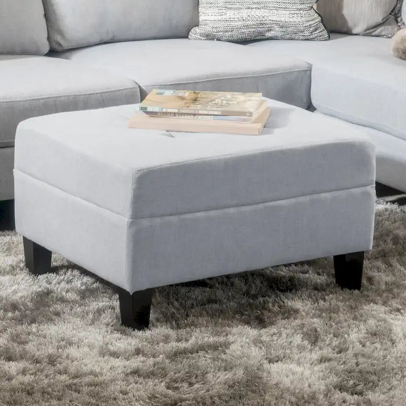 Pouf ottoman en tissu capitonné