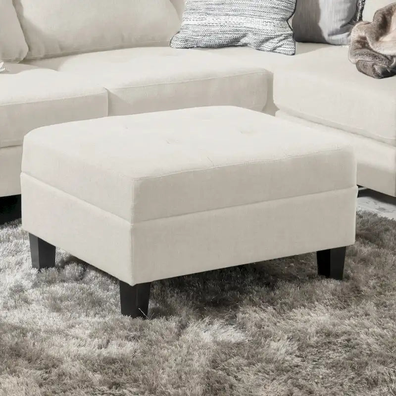 Pouf ottoman en tissu capitonné