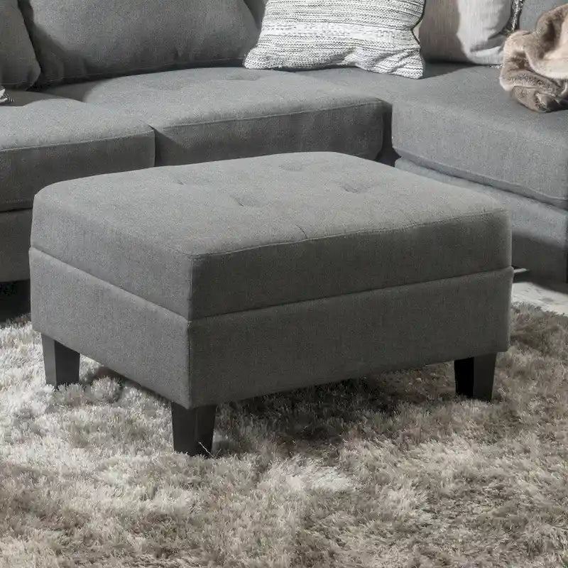 Pouf ottoman en tissu capitonné