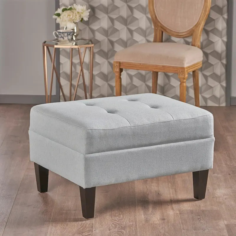 Pouf ottoman en tissu capitonné