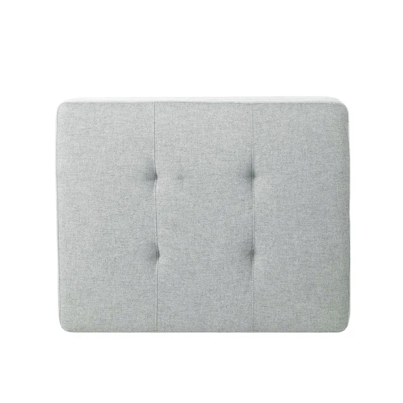 Pouf ottoman en tissu capitonné