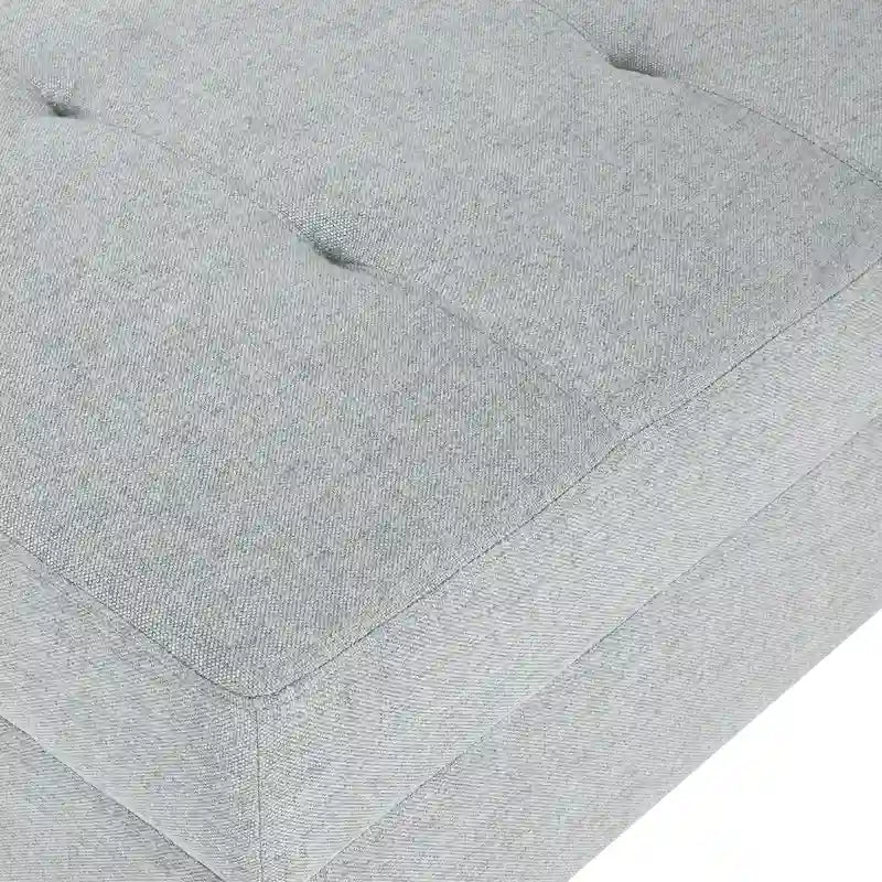 Pouf ottoman en tissu capitonné