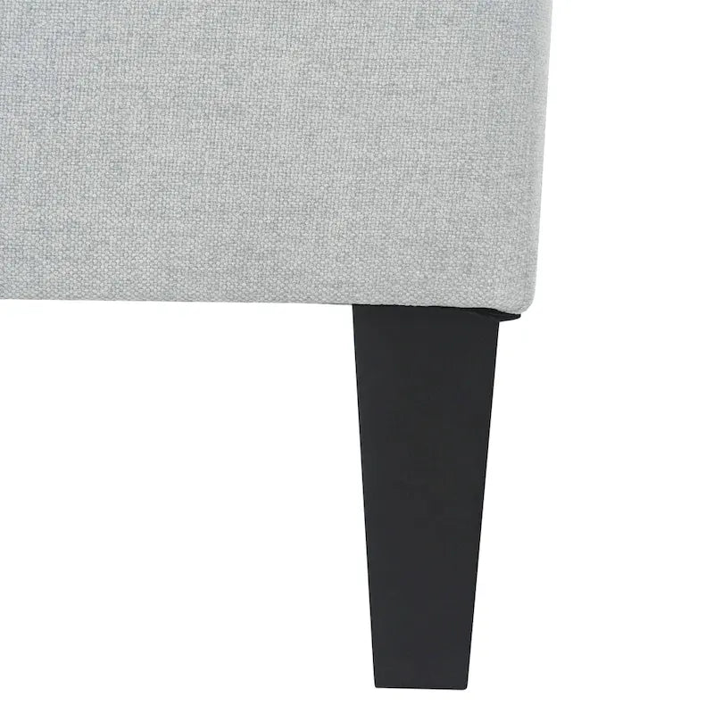 Pouf ottoman en tissu capitonné