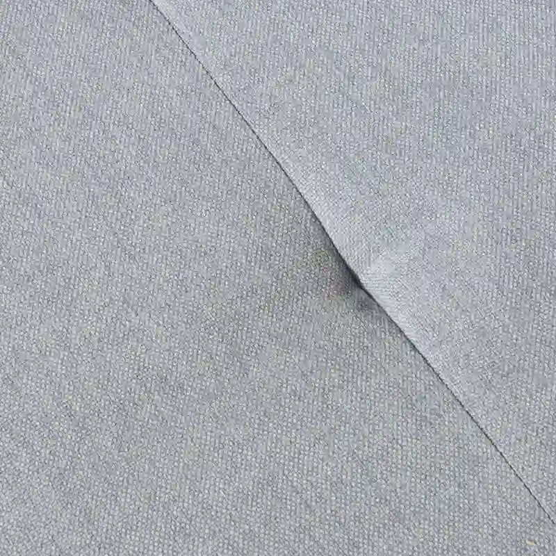 Pouf ottoman en tissu capitonné
