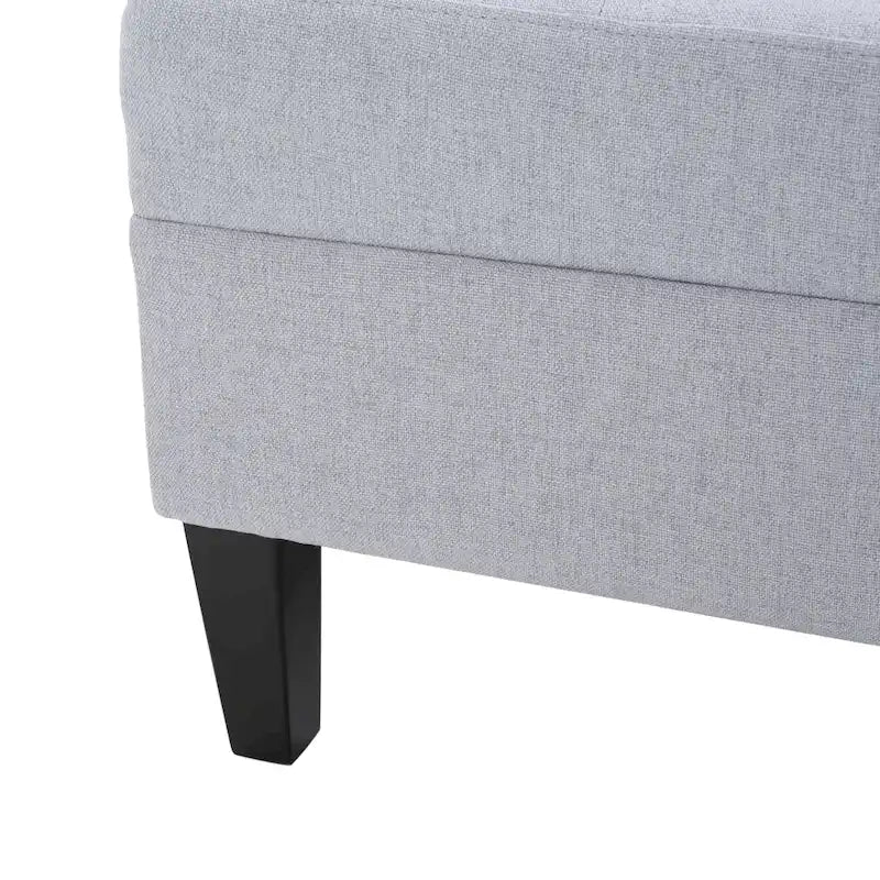Pouf ottoman en tissu capitonné