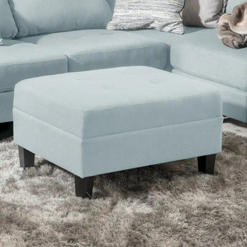 Pouf ottoman en tissu capitonné