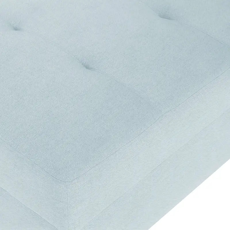 Pouf ottoman en tissu capitonné